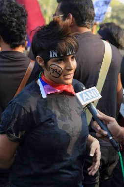 Lesbian gay protesting against Supreme Court  Maheshwari Udyan Matunga Mumbai Maharashtra India 15th December 2013  clipart