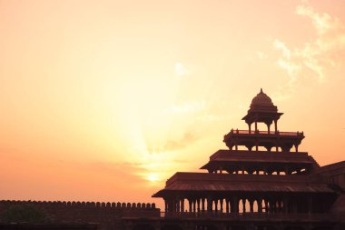 Sunrise at Panch Mahal in Fatehpur Sikri built during second half of 16th century made from red sandstone ; capital of Mughal empire ; Agra; Uttar Pradesh ; India UNESCO World Heritage Site clipart