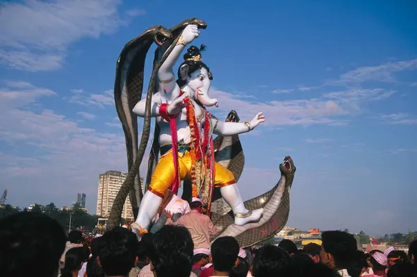 stock image idol of lord ganesh (elephant headed god)  ;  Ganesh ganpati Festival ; mumbai bombay ; maharashtra ; india