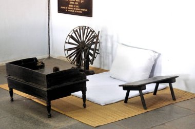 Charkha kept in mahatma gandhi room at sabarmati ashram, Ahmedabad, Gujarat, India  clipart