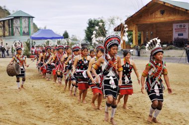 Naga tribe men and women at hornbill festival, Kohima, Kisama village, Nagaland, North East, India   clipart