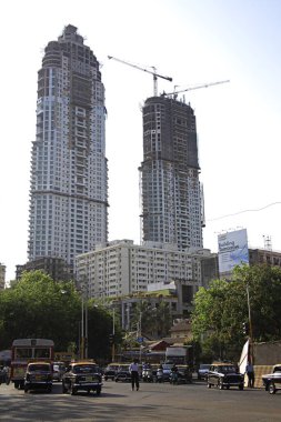 Construction of a new skyscraper at Krantiveer Vasantrao Narayanrao Naik Chowk called as Tardeo Chowk, Bombay now Mumbai, Maharashtra, India  clipart