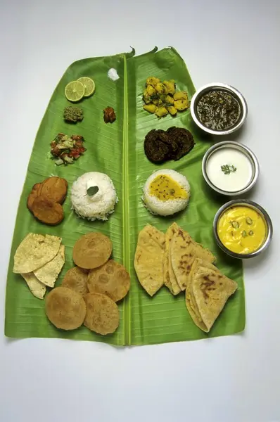 stock image maharashtrian food on banana leaf , india