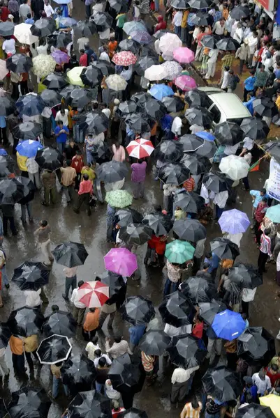 Stock image Aerial view of people using colorful umbrellas near Dadar, Mumbai Bombay, Maharashtra, India