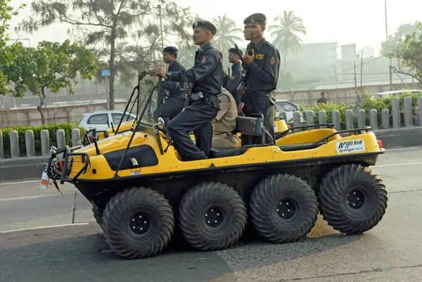 Stock image Mumbai police commandos in eight wheel amphibious vehicle at marine drive  ; Bombay ; Mumbai ; Maharashtra  ; India NOMR