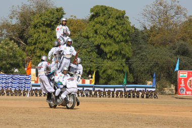 Army performing Synchronised balancing act on motor cycles at Jabalpur Madhya Pradesh India Asia  clipart