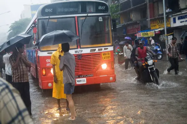 stock image Season Monsoon, Heavy raining and water logging on Suburb road dated 5th july2006, Bombay Mumbai, Maharashtra, India 