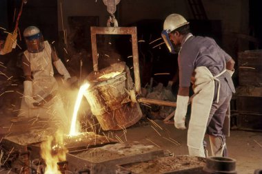 men workers on steel plant , india clipart