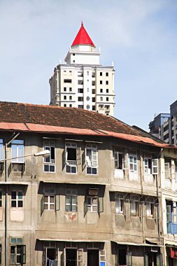 Old mud roof building chawl mass urban housing, Raja Rammohan Roy Road, Girgaon, Charni Road, Bombay Mumbai, Maharashtra, India  clipart