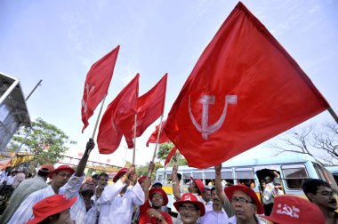 CPM Electioneering arrangement with Party flags and workers assembled at a place in Kolkata India   clipart