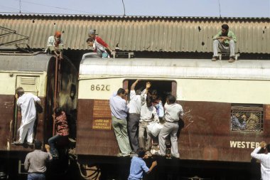 people crowd on local Train railway, india  clipart