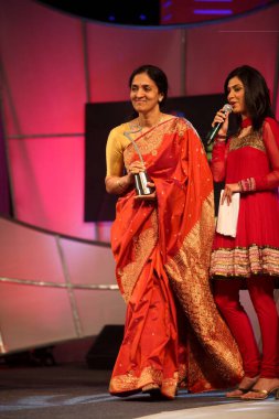 Chitra Ramakrishnan, Deputy Managing Director of National Stock Exchange receives CNBC,TV18s Outstanding Woman Business Leader Award at CNBC,TV18 Indian Business Leader Award, Bombay Mumbai, Maharashtra, India   clipart