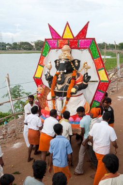 Lord ganesh immersion in muthannankulam tank, Coimbatore, Tamil Nadu, India    clipart