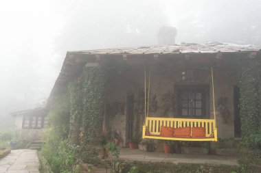 Swing in morning mist, Deodars Guest House, Papersali, Almora, Uttarakhand, India, Asia clipart