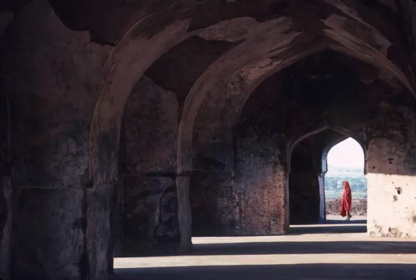 stock image woman through arches in Rani Rupmati Pavilion, Mandu, madhya pradesh, india.