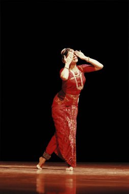 Indian Classical Dancer Malavika Sarrukkai performing a solo Bharat Natyam Dance, India clipart