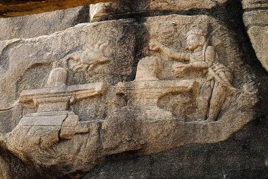 Kannappa Nayanar one of sixty three nayanmars or holy saivite saints bas relief on rock in Veerabhadra temple in  sixteenth century ; Lepakshi ; Andhra Pradesh ; India clipart