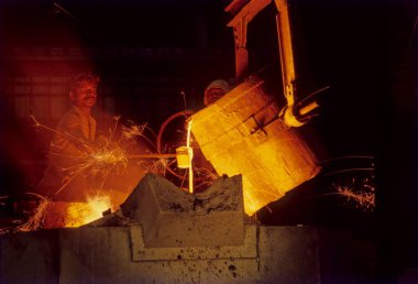 men working on steel plant , india clipart