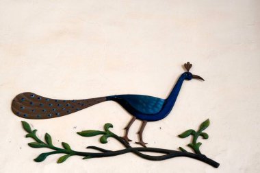 Painted peacock on wall in scindia museum of jaivilas palace , Gwalior , Madhya Pradesh , India clipart