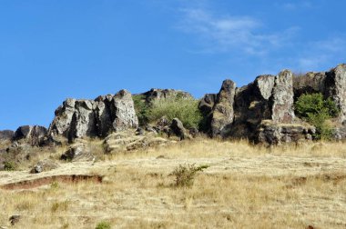 Rocks against blue sky ; Panchgani  ; Maharashtra ; India clipart