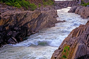 River Narmada gorge with marble rocks ; Bedaghat ; Jabalpur ; Madhya Pradesh ; India clipart