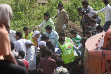 Dead body being taken away by rescue and evacuation work, thane maharashtra, india, asia  clipart