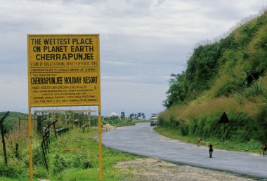 Cherrapunjee Road and name board the wettest place in the world, India  clipart