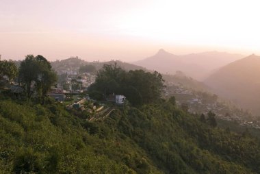 Sun rise on Palani hills at 2133 meters above sea level ; Kodaikanal popularly known as Kodai ; Tamil Nadu ; India clipart