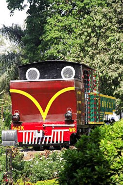 Old steam rail engine at Mumbai central terminus at Dr. Anand Nair Marg called as Lamington road ; Bombay now Mumbai ; Maharashtra ; India clipart
