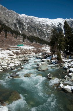 Sindh river flowing, alpine hill station, kashmir, india, asia clipart