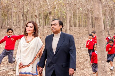 Indian businessman Mukesh Ambani and Nita Ambani jamnagar gujarat India Asia   clipart