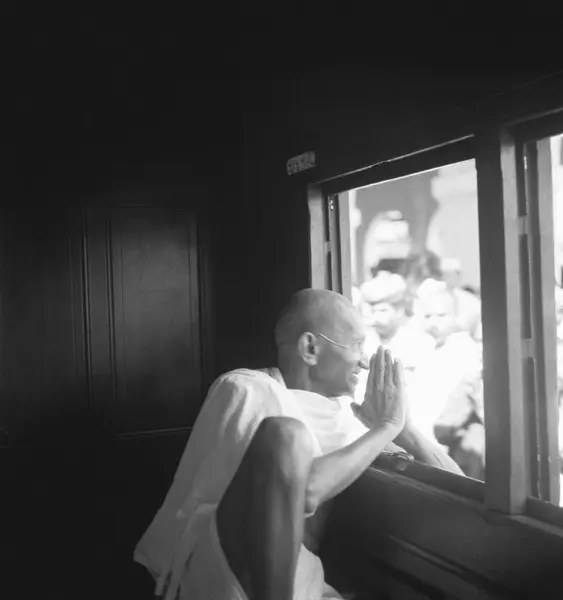 stock image Mahatma Gandhi , greeting people through the window of a train , 1940 