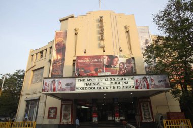Regal cinema hall entrance door; showing Mix doubles & Narnia Colaba Bombay Mumbai; Maharashtra; India clipart