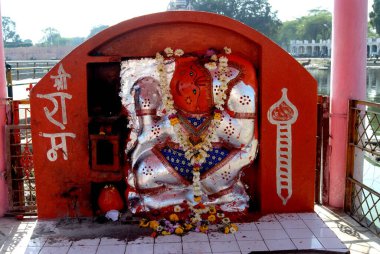Suryamukhi Hanuman maruti idol at Ram ghat at Ujjain city ; Madhya Pradesh ; India clipart