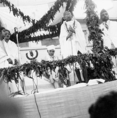 Mahatma Gandhi during the opening ceremony of Kamla Nehru Memorial Hospital at Allahabad, 28th February 1941, Madan Mohan Malaviya and Dr. Jivraj Mehta, India   clipart
