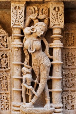 Alasika ; Rani ki vav ; step well ; stone carving ; Patan ; Gujarat ; India clipart