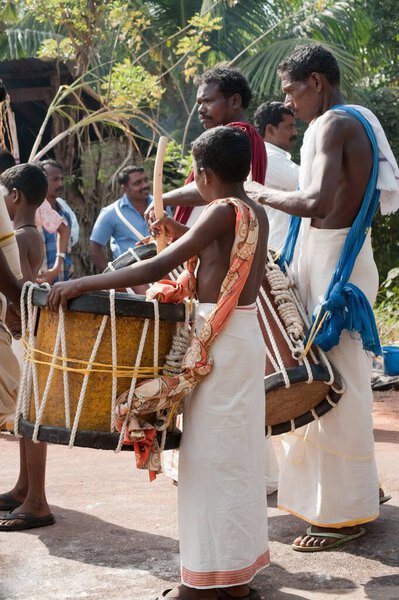 Musicians playing jendai drums, Kerala, India   