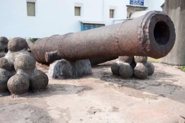 Portuguese cannon guns at church, old goa, india, asia clipart