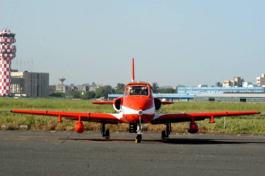 HA flight of Surya Kiran is an aerobatics demonstration team of the Indian Air Force, Sahar International Airport now Chhatrapati Shivaji International Airport, Mumbai Bombay, Maharashtra, India  clipart