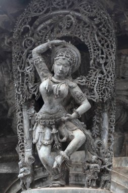 Bracket statue of dancer at Channa Keshava temple, Belur, Karnataka, India  clipart