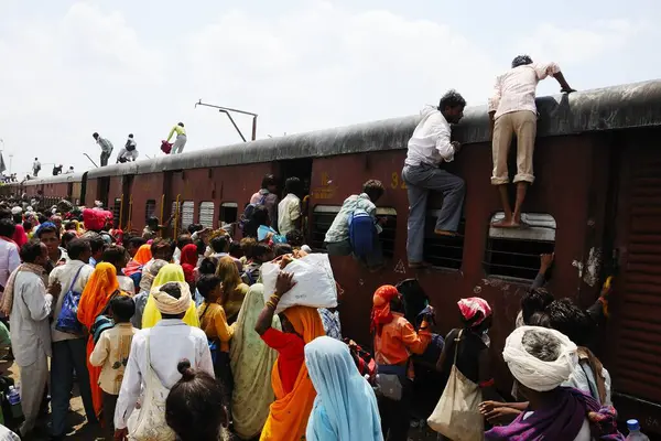 stock image Commuters climbing on roof of train ; Jodhpur ; Rajasthan ; India