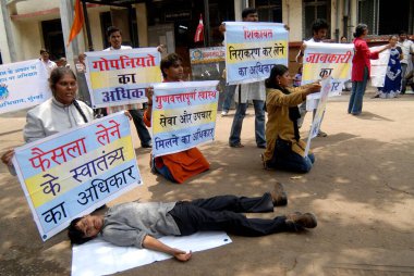 Street play by non government organization NGO creating awareness about patients rights at Ghatkopar in Bombay Mumbai, Maharashtra, India    clipart