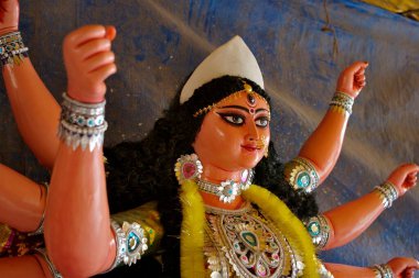Goddess Durga sculpture made of clay for Durga Pooja celebration ; Rajkot ; Gujarat ; India clipart