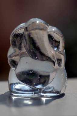 Tanrım, camdaki Ganesh. 