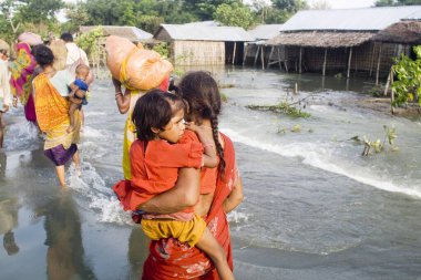 Kosi river flood in year 2008 which mostly made suffered below poverty line people in Purniya district ; Bihar ; India clipart