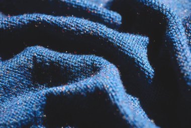 Arkaplan olarak mavi yün kumaş