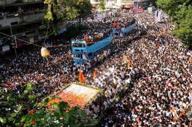 Balasaheb Thackeray Funeral Procession Crowd shots and General Shots on road mumbai maharashtra Nov 2012  clipart