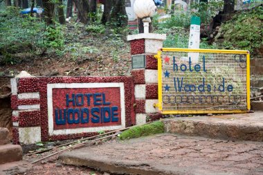 Hotel Woodsides sign board ; Hill station forest, Matheran ; Maharashtra ; India clipart