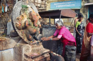 Statue of  God Ganesh ganpati in meenakshi temple ; madurai ; tamil nadu ; india clipart