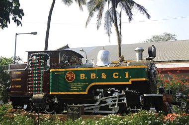 Old steam rail engine at Mumbai central terminus at Dr. Anand Nair Marg called as Lamington road ; Bombay now Mumbai ; Maharashtra ; India clipart